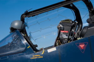 fighter jet cockpit with canopy open